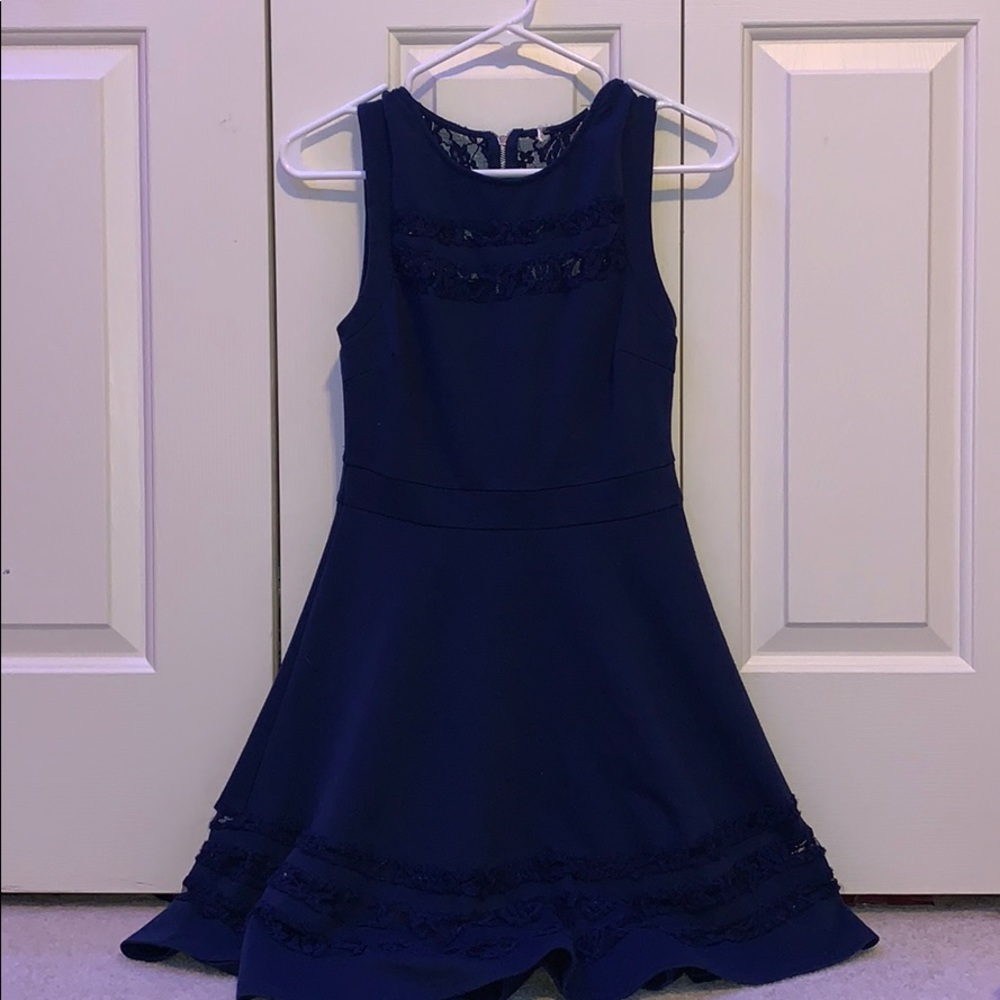Navy dress, with lace patterns